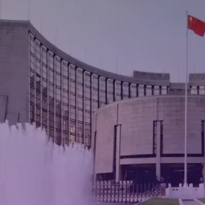 PBOC's Pan Gongsheng signals slower credit growth, offshore FX push