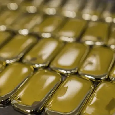 Gold Edges Lower as Robust US Jobs Data Point to Higher Rates