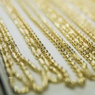 Gold Steadies Near $4,000 as Stronger Dollar, Rate Outlook Weigh