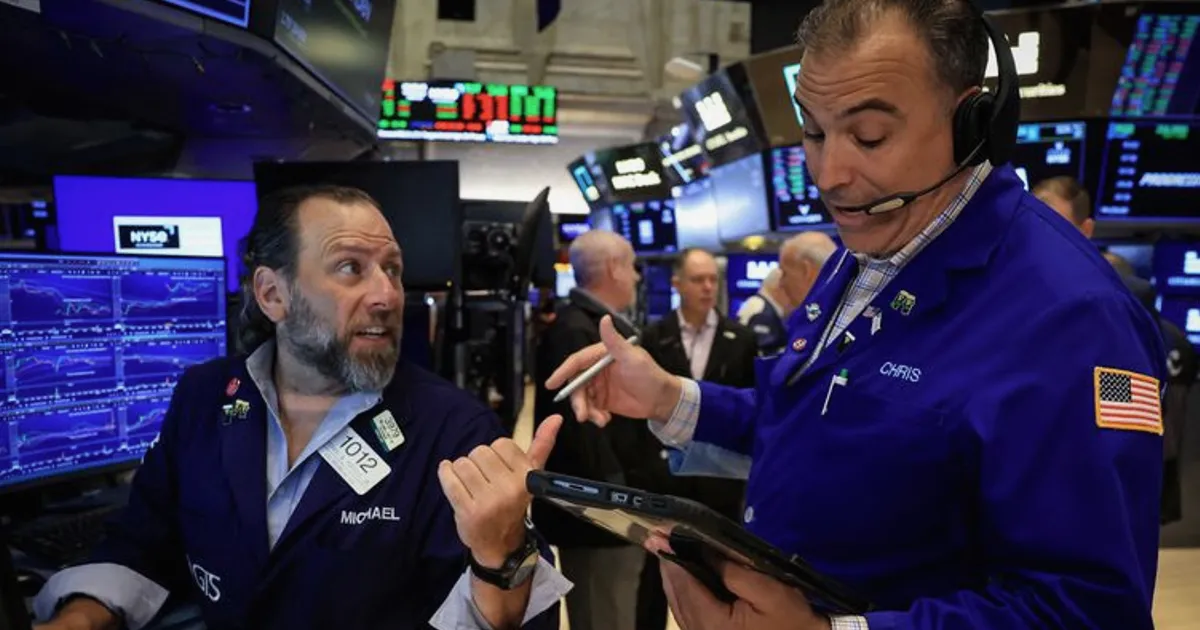 Stocks rebound, dollar climbs to one-year high