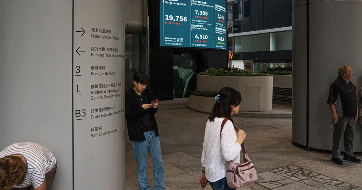 China Stocks in Hong Kong Near Bear Market on Spending Woes