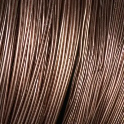 Copper Holds Losses as Dollar Strength, Hawkish Fed Weigh on Metals